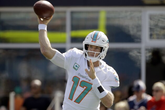 Miami Dolphins quarterback Ryan Tannehill warms up before an NFL football game against the New England Patriots, Sunday, Sept. 30, 2018, in Foxborough, Mass. (AP Photo/Steven Senne)
