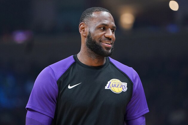 SAN JOSE, CA - OCTOBER 12:  LeBron James #23 of the Los Angeles Lakers looks on smiling while there's a time out against the Golden State Warriors during the first half of their NBA preseason basketball game at SAP Center on October 12, 2018 in San Jose, California. NOTE TO USER: User expressly acknowledges and agrees that, by downloading and or using this photograph, User is consenting to the terms and conditions of the Getty Images License Agreement.  (Photo by Thearon W. Henderson/Getty Images)