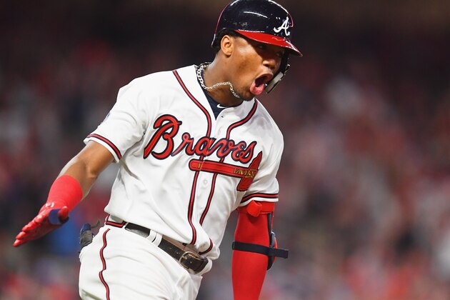 ATLANTA, GA - OCTOBER 07:  Ronald Acuna Jr. #13 of the Atlanta Braves runs the bases after hitting a grand slam home run in the second inning against the Los Angeles Dodgers during Game Three of the National League Division Series at SunTrust Park on October 7, 2018 in Atlanta, Georgia.  (Photo by Scott Cunningham/Getty Images)