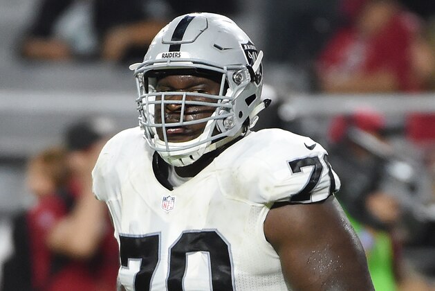 GLENDALE, AZ - AUGUST 12:  Kelechi Osemele #70 of the Oakland Raiders runs back to the huddle after the end of a play against the Arizona Cardinals at University of Phoenix Stadium on August 12, 2016 in Glendale, Arizona.  (Photo by Norm Hall/Getty Images)