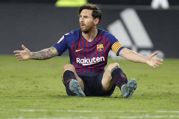 Barcelona forward Lionel Messi reacts after failing to score against Valencia during the Spanish La Liga soccer match between Valencia and Barcelona, at the Mestalla stadium in Valencia, Spain, Sunday, Oct. 7, 2018. (AP Photo/Alberto Saiz)