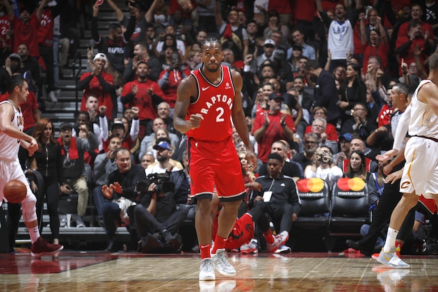 TORONTO, CANADA - OCTOBER 17: Kawhi Leonard #2 of the Toronto Raptors reacts to a play during the game against the Cleveland Cavaliers on October 17, 2018 at Scotiabank Arena in Toronto, Ontario, Canada. NOTE TO USER: User expressly acknowledges and agrees that, by downloading and/or using this photograph, user is consenting to the terms and conditions of the Getty Images License Agreement. Mandatory Copyright Notice: Copyright 2018 NBAE (Photo by Mark Blinch/NBAE via Getty Images)