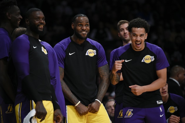 Los Angeles Lakers forward LeBron James reacts from the bench during the second half of an NBA preseason basketball game against the Sacramento Kings in Los Angeles, Thursday, Oct. 4, 2018. The Lakers won 128-123. (AP Photo/Kelvin Kuo)