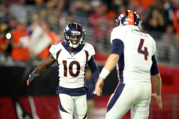GLENDALE, AZ - OCTOBER 18:  Wide receiver Emmanuel Sanders #10 reacts with teammate quarterback Case Keenum #4 of the Denver Broncos after scoring a 64-yard touchdown during the second quarter against the Arizona Cardinals at State Farm Stadium on October 18, 2018 in Glendale, Arizona.  (Photo by Christian Petersen/Getty Images)
