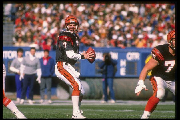 25 Sep 1988: Quarterback Boomer Esiason of the Cincinnati Bengals looks to throw the ball during a game against the Cleveland Browns at Riverfront Stadium in Cincinnati, Ohio. The Browns won the game, 23-16.