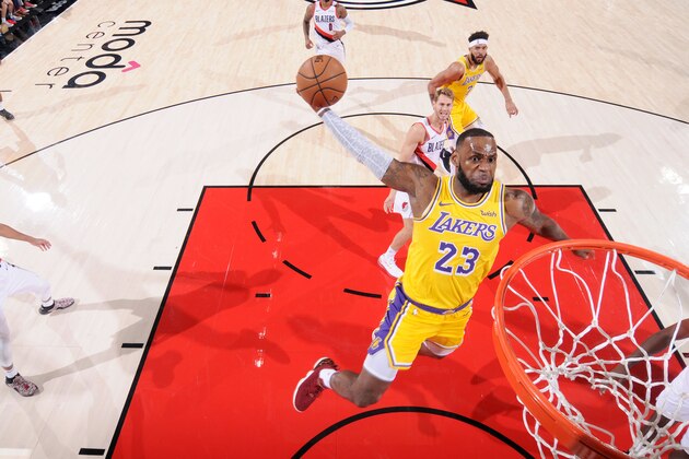 PORTLAND, OR - OCTOBER 18: LeBron James #23 of the Los Angeles Lakers dunks the ball against the Portland Trail Blazers on October 18, 2018 at the Moda Center in Portland, Oregon. NOTE TO USER: User expressly acknowledges and agrees that, by downloading and/or using this photograph, user is consenting to the terms and conditions of the Getty Images License Agreement. Mandatory Copyright Notice: Copyright 2018 NBAE (Photo by Sam Forencich/NBAE via Getty Images)