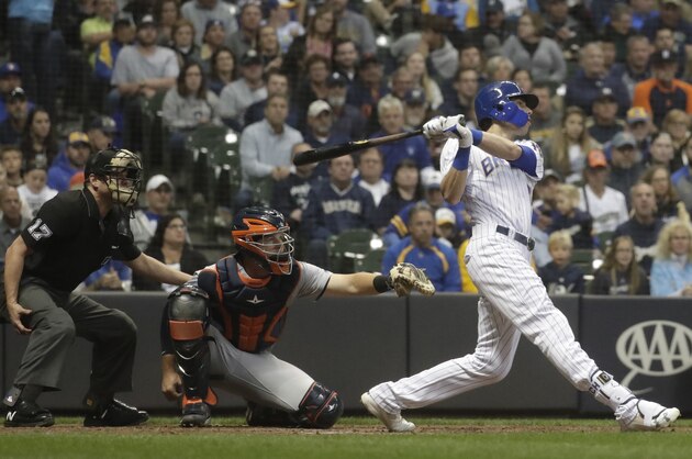 Milwaukee Brewers' Christian Yelich hits a home run during the seventh inning of a baseball game against the Detroit Tigers Saturday, Sept. 29, 2018, in Milwaukee. (AP Photo/Morry Gash)
