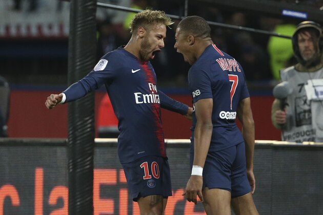 PARIS, FRANCE - OCTOBER 7: Kylian Mbappe of PSG celebrates his goal with Neymar Jr (left) during the french Ligue 1 match between Paris Saint-Germain (PSG) and Olympique Lyonnais (OL, Lyon) at Parc des Princes stadium on October 7, 2018 in Paris, France. (Photo by Jean Catuffe/Getty Images)