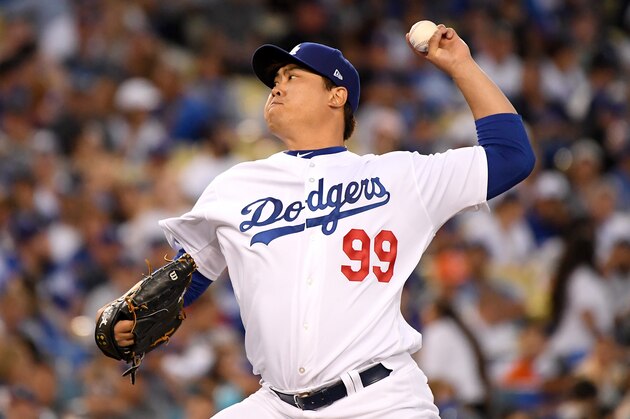 LOS ANGELES, CA - OCTOBER 04:  Hyun-Jin Ryu #99 of the Los Angeles Dodgers delivers the pitch against the Atlanta Braves during Game One of the National League Division Series at Dodger Stadium on October 4, 2018 in Los Angeles, California.  (Photo by Harry How/Getty Images)