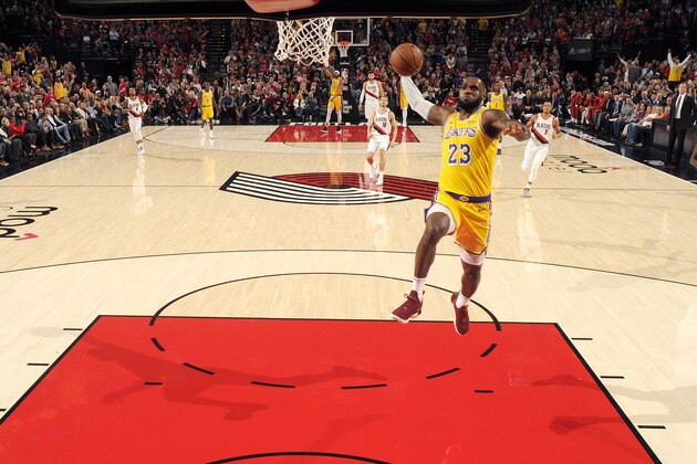 PORTLAND, OR - OCTOBER 18: LeBron James #23 of the Los Angeles Lakers dunks the ball against the Portland Trail Blazers on October 18, 2018 at the Moda Center in Portland, Oregon. NOTE TO USER: User expressly acknowledges and agrees that, by downloading and/or using this photograph, user is consenting to the terms and conditions of the Getty Images License Agreement. Mandatory Copyright Notice: Copyright 2018 NBAE (Photo by Cameron Browne/NBAE via Getty Images)