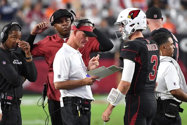 GLENDALE, AZ - OCTOBER 18:  Offensive coordinator Mike McCoy (front), quarterbacks coach Byron Leftwich and head coach Steve Wilks talk with quarterback Josh Rosen #3 of the Arizona Cardinals during the second half against the Denver Broncos at State Farm Stadium on October 18, 2018 in Glendale, Arizona.  (Photo by Norm Hall/Getty Images)