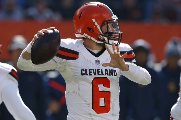 Cleveland Browns quarterback Baker Mayfield looks to throw in the first half during an NFL football game against the Los Angeles Chargers, Sunday, Oct. 14, 2018, in Cleveland. (AP Photo/Ron Schwane)