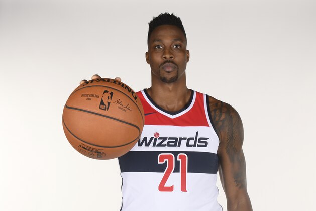Washington Wizards center Dwight Howard poses for a photograph during an NBA basketball media day, Monday, Sept. 24, 2018, in Washington. (AP Photo/Nick Wass)