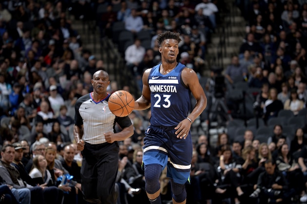 SAN ANTONIO, TX - OCTOBER 17: Jimmy Butler #23 of the Minnesota Timberwolves handles the ball against the San Antonio Spurs during a game on October 17, 2018 at the AT&T Center in San Antonio, Texas. NOTE TO USER: User expressly acknowledges and agrees that, by downloading and or using this photograph, user is consenting to the terms and conditions of the Getty Images License Agreement. Mandatory Copyright Notice: Copyright 2018 NBAE (Photos by Mark Sobhani/NBAE via Getty Images)