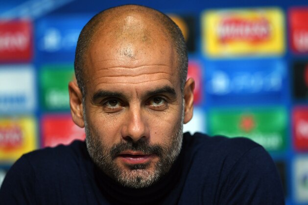 Manchester City's Spanish manager Pep Guardiola speaks at a press conference in Manchester, north west England on September 25, 2017, ahead of their UEFA Champions League Group F match against Shaktar Donetsk on September 26. / AFP PHOTO / Paul ELLIS        (Photo credit should read PAUL ELLIS/AFP/Getty Images)