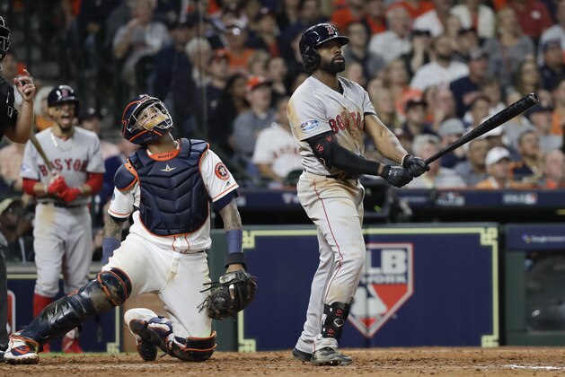 Boston Red Sox's Jackie Bradley Jr., watches after his two-run home run against the Houston Astros during the sixth inning in Game 4 of a baseball American League Championship Series on Wednesday, Oct. 17, 2018, in Houston.(AP Photo/David J. Phillip)
