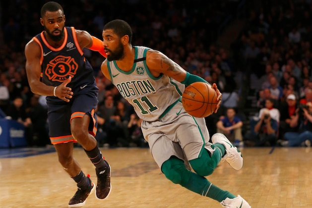 NEW YORK, NY - FEBRUARY 24:  (NEW YORK DAILIES OUT)    Kyrie Irving #11 of the Boston Celtics in action against Tim Hardaway Jr. #3 of the New York Knicks at Madison Square Garden on February 24, 2018 in New York City. The Celtics defeated the Knicks 121-112. NOTE TO USER: User expressly acknowledges and agrees that, by downloading and/or using this Photograph, user is consenting to the terms and conditions of the Getty Images License Agreement.  (Photo by Jim McIsaac/Getty Images)
