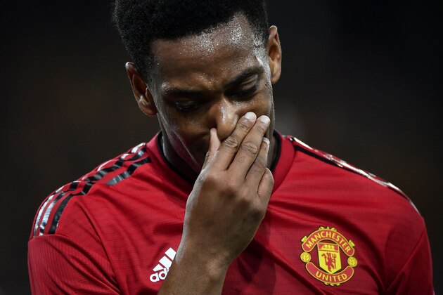 Manchester United's French striker Anthony Martial reacts during the UEFA Champions League group H football match between Young Boys and Manchester United at The Stade de Suisse in Bern on September 19, 2018. (Photo by Fabrice COFFRINI / AFP)        (Photo credit should read FABRICE COFFRINI/AFP/Getty Images)