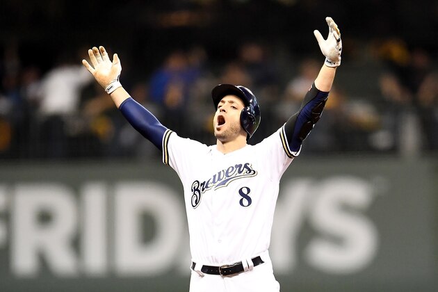 MILWAUKEE, WI - OCTOBER 19:  Ryan Braun #8 of the Milwaukee Brewers celebrates after hitting an RBI double to score Christian Yelich #22 against Hyun-Jin Ryu #99 of the Los Angeles Dodgers during the second inning in Game Six of the National League Championship Series at Miller Park on October 19, 2018 in Milwaukee, Wisconsin.  (Photo by Stacy Revere/Getty Images)