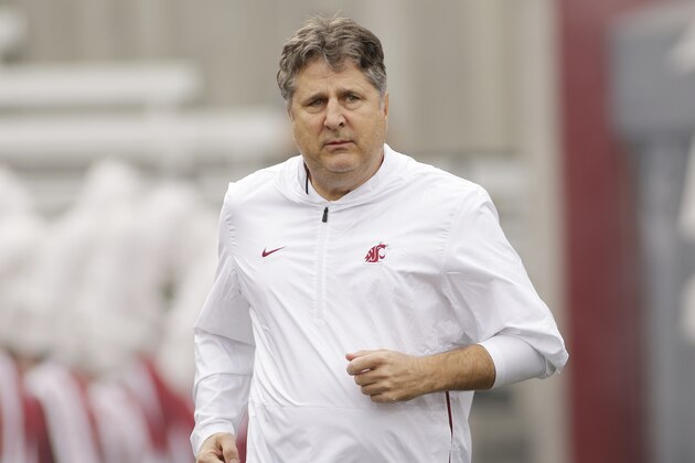 Washington State head coach Mike Leach runs onto the field before an NCAA college football game against Utah in Pullman, Wash., Saturday, Sept. 29, 2018. (AP Photo/Young Kwak)