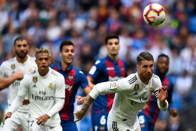 Real Madrid's Spanish defender Sergio Ramos eyes the ball during the Spanish league football match Real Madrid CF against Levante UD at the Santiago Bernabeu stadium in Madrid on October 20, 2018. (Photo by GABRIEL BOUYS / AFP)        (Photo credit should read GABRIEL BOUYS/AFP/Getty Images)