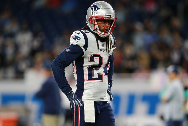 DETROIT, MI - SEPTEMBER 23: Stephon Gilmore #24 of the New England Patriots warms up prior to the start of the game against the Detroit Lions at Ford Field on September 23, 2018 in Detroit, Michigan.  (Photo by Rey Del Rio/Getty Images)