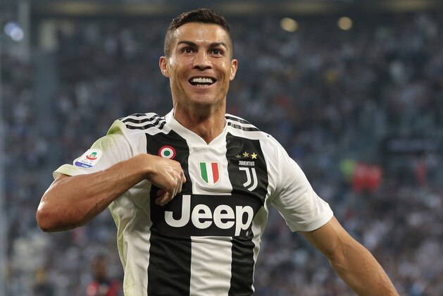 TURIN, ITALY - OCTOBER 20:  Cristiano Ronaldo of Juventus FC celebrates after scoring the opening goal during the Serie A match between Juventus and Genoa CFC at Allianz Stadium on October 20, 2018 in Turin, Italy.  (Photo by Emilio Andreoli/Getty Images )