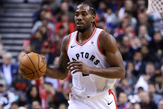 TORONTO, ON - OCTOBER 19:  Kawhi Leonard #2 of the Toronto Raptors dribbles the ball during the second half of an NBA game against the Boston Celtics at Scotiabank Arena on October 19, 2018 in Toronto, Canada.  NOTE TO USER: User expressly acknowledges and agrees that, by downloading and or using this photograph, User is consenting to the terms and conditions of the Getty Images License Agreement.  (Photo by Vaughn Ridley/Getty Images)