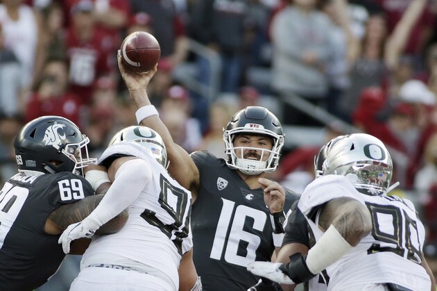 Washington State quarterback Gardner Minshew (16) throws a pass during the first half of an NCAA college football game against Oregon in Pullman, Wash., Saturday, Oct. 20, 2018. (AP Photo/Young Kwak)