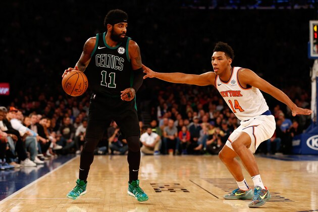 NEW YORK, NY - OCTOBER 20:  Kyrie Irving #11 of the Boston Celtics drives to the net against Allonzo Trier #14 of the New York Knicks at Madison Square Garden on October 20, 2018 in New York City.  (Photo by Mike Stobe/Getty Images)