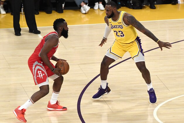 LOS ANGELES, CA - OCTOBER 20: LeBron James #23 of the Los Angeles Lakers defends against James Harden #13 of the Houston Rockets as he makes his home debut at Staples Center on October 20, 2018 in Los Angeles, California. NOTE TO USER: User expressly acknowledges and agrees that, by downloading and or using this photograph, User is consenting to the terms and conditions of the Getty Images License Agreement. (Photo by Kevork Djansezian/Getty Images)