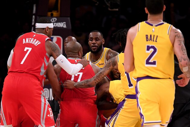 LOS ANGELES, CA - OCTOBER 20:  Chris Paul #3 of the Houston Rockets and Rajon Rondo #9 of the Los Angeles Lakers fight during a 124-115 Rockets win at Staples Center on October 20, 2018 in Los Angeles, California.  (Photo by Harry How/Getty Images)
