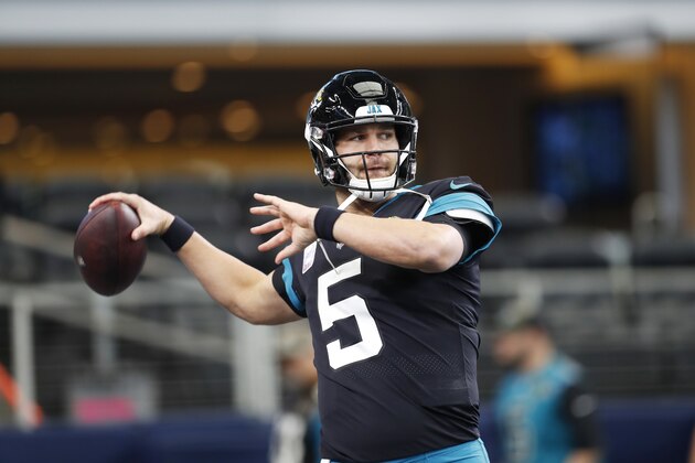 Jacksonville Jaguars quarterback Blake Bortles (5) throws during warm-ups before an NFL football game against the Dallas Cowboys in Arlington, Texas, Sunday, Oct. 14, 2018. (AP Photo/Jim Cowsert)