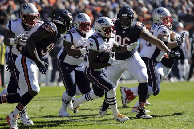 New England Patriots running back Sony Michel (26) runs during the first half of an NFL football game against the Chicago Bears Sunday, Oct. 21, 2018, in Chicago. (AP Photo/Nam Y. Huh)