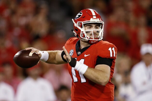 Georgia quarterback Jake Fromm prepares to throw a pass during the first half of the team's NCAA college football game against Vanderbilt on Saturday, Oct. 6, 2018, in Atlanta. (AP Photo/John Bazemore)