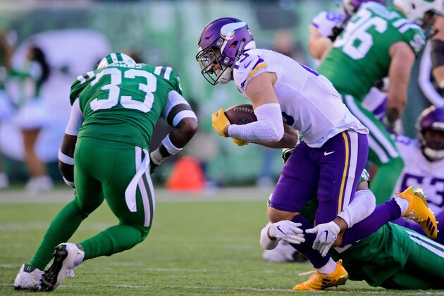 EAST RUTHERFORD, NJ - OCTOBER 21:  Adam Thielen #19 of the Minnesota Vikings is hit by Jamal Adams #33 of the New York Jets during the fourth quarter at MetLife Stadium on October 21, 2018 in East Rutherford, New Jersey. The Vikings defeated the Jets 37-17.  (Photo by Steven Ryan/Getty Images)
