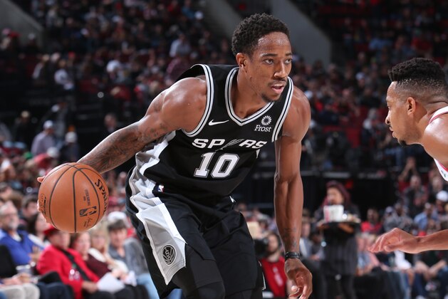 PORTLAND, OR - OCTOBER 20: DeMar DeRozan #10 of the San Antonio Spurs handles the ball against the Portland Trail Blazers on October 20, 2018 at the Moda Center in Portland, Oregon. NOTE TO USER: User expressly acknowledges and agrees that, by downloading and or using this Photograph, user is consenting to the terms and conditions of the Getty Images License Agreement. Mandatory Copyright Notice: Copyright 2018 NBAE (Photo by Sam Forencich/NBAE via Getty Images)