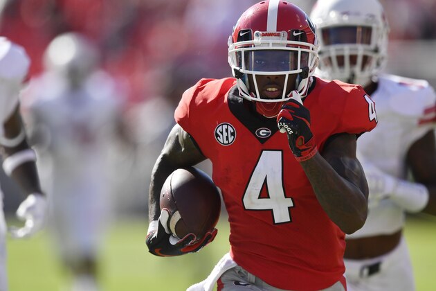 Georgia wide receiver Mecole Hardman (4) runs for a touchdown against Austin Peay during the first half of an NCAA college football game, Saturday, Sept. 1, 2018, in Athens, Ga. (AP Photo/Mike Stewart)
