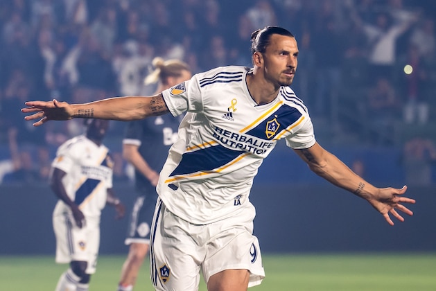 CARSON, CA - SEPTEMBER 29: Zlatan Ibrahimovic #9 of Los Angeles Galaxy celebrates his penalty kick goal during the Los Angeles Galaxy's MLS match against Vancouver Whitecaps at the StubHub Center on September 29, 2018 in Carson, California.  The Los Angeles Galaxy won the match 3-0 (Photo by Shaun Clark/Getty Images)