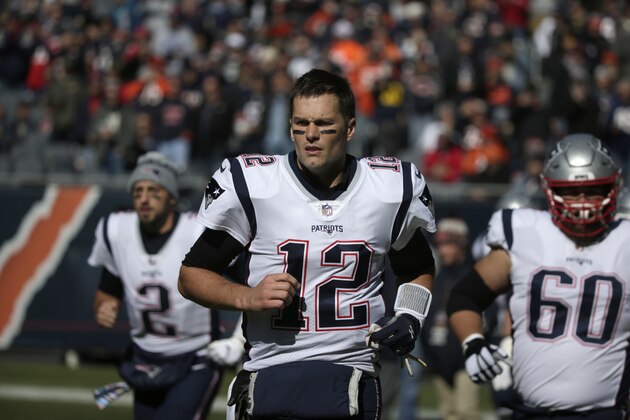 New England Patriots quarterback Tom Brady (12) takes the field before an NFL football game against the Chicago Bears Sunday, Oct. 21, 2018, in Chicago. (AP Photo/David Banks)