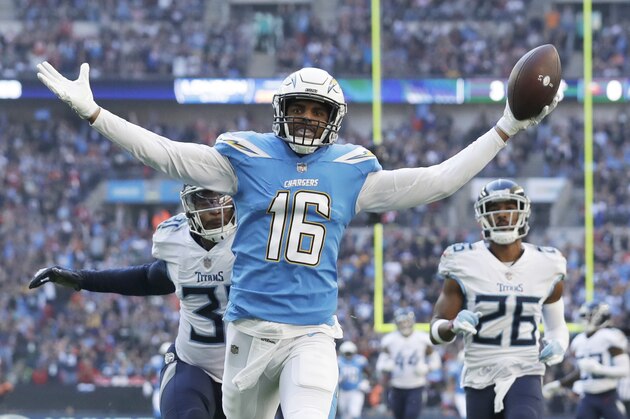 Los Angeles Chargers wide receiver Tyrell Williams (16) celebrates as he scores a touchdown during the first half of an NFL football game against Tennessee Titans at Wembley stadium in London, Sunday, Oct. 21, 2018. (AP Photo/Matt Dunham)