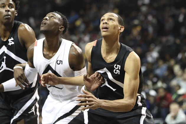The Black Team's Darius Bazley #55 in action against the White Team during the Jordan Brand Classic high school basketball game, Sunday, April 8, 2018, in Brooklyn. (AP Photo/Gregory Payan)