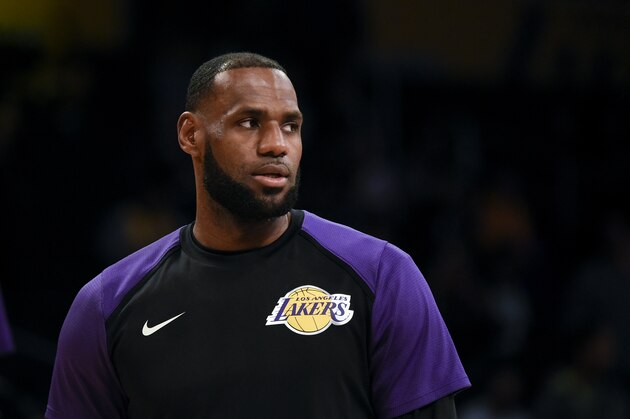 Los Angeles Lakers forward LeBron James warms up prior to an NBA preseason basketball game against the Sacramento Kings in Los Angeles, Thursday, Oct. 4, 2018. (AP Photo/Kelvin Kuo)