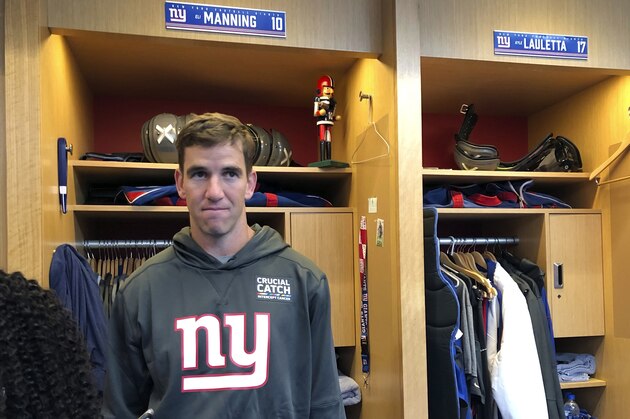New York Giants quarterback Eli Manning speaks with reporters inside the NFL football team's locker room, Thursday, Oct. 18, 2018, in East Rutherford, N.J. The Giants are heading to Atlanta to play the Falcons on Monday night. (AP Photo/Tom Canavan) New York Giants quarterback Eli Manning speaks with reporters inside the NFL football team's locker room, Thursday, Oct. 18, 2018, in East Rutherford, N.J. The Giants are heading to Atlanta to play the Falcons on Monday night. (AP Photo/Tom Canavan)