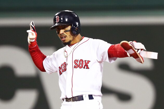 BOSTON, MA - SEPTEMBER 9:  Mookie Betts #50 of the Boston Red Sox reacts at second base after hitting a double in the third inning of a game against the Houston Astros at Fenway Park on September 9, 2018 in Boston, Massachusetts.  (Photo by Adam Glanzman/Getty Images)
