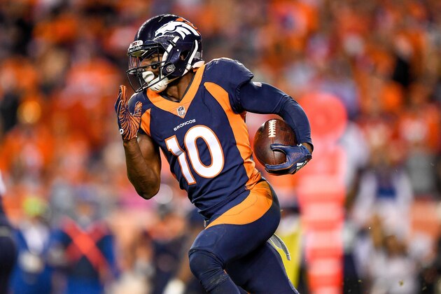 DENVER, CO - OCTOBER 1:  Wide receiver Emmanuel Sanders #10 of the Denver Broncos carries the ball after a reception against the Kansas City Chiefs in the third quarter at Broncos Stadium at Mile High on October 1, 2018 in Denver, Colorado. (Photo by Dustin Bradford/Getty Images)