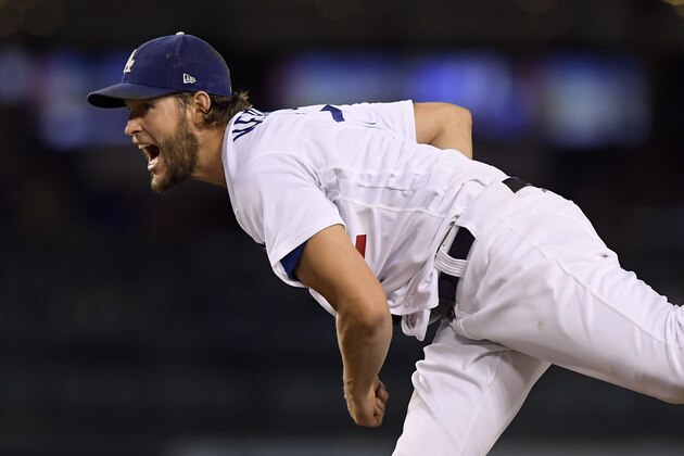 Los Angeles Dodgers' Clayton Kershaw watches a pitch to the Atlanta Braves during the first inning of Game 2 of a baseball National League Division Series on Friday, Oct. 5, 2018, in Los Angeles. (AP Photo/Mark J. Terrill)