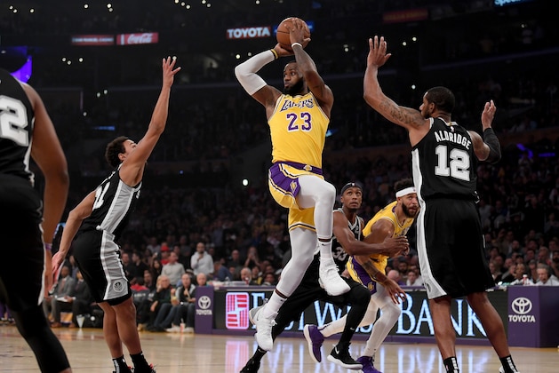 LOS ANGELES, CA - OCTOBER 22: LeBron James #23 of the Los Angeles Lakers passes in front of LaMarcus Aldridge #12 of the San Antonio Spurs during the first half at Staples Center on October 22, 2018 in Los Angeles, California. (Photo by Harry How/Getty Images) LOS ANGELES, CA - OCTOBER 22: LeBron James #23 of the Los Angeles Lakers passes in front of LaMarcus Aldridge #12 of the San Antonio Spurs during the first half at Staples Center on October 22, 2018 in Los Angeles, California. (Photo by Harry How/Getty Images)
