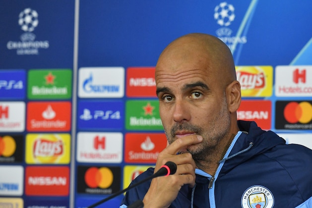 Manchester City head coach Josep Guardiola attends a press conference in Kharkiv on October 22, 2018, a day before the UEFA Champion League football match  between Shakhtar Donetsk and Manchester City at the Metallist stadium in Kharkiv. (Photo by GENYA SAVILOV / AFP)        (Photo credit should read GENYA SAVILOV/AFP/Getty Images)