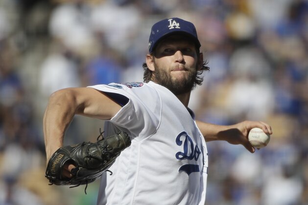 Los Angeles Dodgers starting pitcher Clayton Kershaw throws during the first inning of Game 5 of the National League Championship Series baseball game against the Milwaukee Brewers Wednesday, Oct. 17, 2018, in Los Angeles. (AP Photo/Jae Hong)